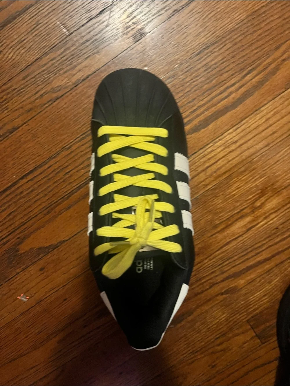 adidas Black Sneakers with Yellow Laces and White Stripes